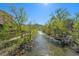 Scenic view of the river running through Golden, Colorado, surrounded by lush greenery at 2109 Jackson St, Golden, CO 80401