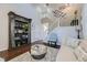 Elegant living room featuring high ceilings, a staircase, and refined decor with lots of natural light at 9544 Longford Way, Parker, CO 80134