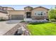 Charming single-Gathering home featuring a stone facade, well-manicured lawn, and inviting front entrance at 2134 S Poppy St, Lakewood, CO 80228