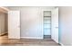 Bright room featuring vinyl floors and a closet at 5898 Parfet Ct, Arvada, CO 80004