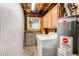 Laundry room with water heater and washing machine at 5898 Parfet Ct, Arvada, CO 80004
