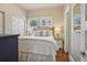 Cozy bedroom with hardwood floors, natural light, and neutral decor at 1176 Gaylord St # 101, Denver, CO 80206