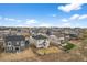 An aerial view of a suburban neighborhood with neatly arranged houses and well-maintained backyards at 17311 Rose Mallow St, Parker, CO 80134