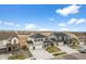 Panoramic aerial view of a residential area showcasing homes and the landscape of the surrounding community at 17311 Rose Mallow St, Parker, CO 80134
