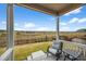 Inviting outdoor patio overlooking a fenced yard and open space at 17311 Rose Mallow St, Parker, CO 80134