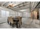 Unfinished basement with exposed ceiling and framing at 17311 Rose Mallow St, Parker, CO 80134