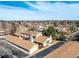 Expansive aerial view of a residential community with mature trees and well-maintained streets under a blue sky at 3657 S Laredo St # E, Aurora, CO 80013