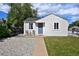 Charming single-story home featuring a well-maintained lawn and inviting front sitting area at 5525 Pierce Ct, Arvada, CO 80002