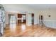 Spacious living area with hardwood floors, open to the kitchen, and offering ample natural light at 11437 W 103Rd Ave, Broomfield, CO 80021