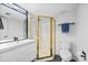 Modern bathroom with a glass-enclosed shower, sleek fixtures, and a minimalist design at 1885 S Quebec Way # J106, Denver, CO 80231