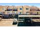 Well-maintained townhouse complex with neat landscaping, parking spaces, and convenient access to amenities at 1885 S Quebec Way # J106, Denver, CO 80231