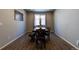 Bright and airy dining room with natural light and simple decor at 26960 E Costilla Dr, Aurora, CO 80016