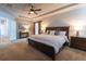 Spacious main bedroom with a barn door leading to the ensuite bathroom at 26960 E Costilla Dr, Aurora, CO 80016