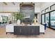 Beautifully designed living room featuring a fireplace, modern decor, and seamless flow to other spaces at 1567 Arrowpoint Ct, Franktown, CO 80116