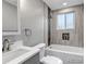 Modern bathroom with shower-tub combo and updated fixtures at 1003 N Jackson St, Golden, CO 80403