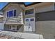 Attractive home featuring a modern front door and a combination of brick and siding exterior at 1003 N Jackson St, Golden, CO 80403