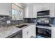 Modern kitchen offers stainless appliances and scenic views at 1003 N Jackson St, Golden, CO 80403