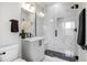 Contemporary bathroom with marble shower and vanity at 4391 Zenobia St, Denver, CO 80212