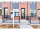 Townhouse boasting a charming front porch and modern aesthetic at 4391 Zenobia St, Denver, CO 80212