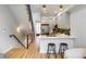 Open concept kitchen with island and breakfast bar at 4391 Zenobia St, Denver, CO 80212