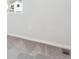 Bedroom showing light gray carpeting with white walls and baseboards at 10735 Hanging Lake Pl, Parker, CO 80138