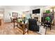 Cozy living room featuring a fireplace and comfortable seating at 19780 W 57Th Ln, Golden, CO 80403