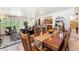 Open concept living room, dining room and kitchen with plenty of light at 19780 W 57Th Ln, Golden, CO 80403