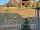 Backyard featuring deer grazing in the grass, with a home and fence in the background at 1784 Cade Ave, Castle Rock, CO 80104