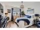 Cozy bedroom with hardwood floors, natural light, and stylish decor at 1784 Cade Ave, Castle Rock, CO 80104