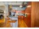 Modern kitchen with wood cabinets and a breakfast bar at 1801 Wynkoop St # 205, Denver, CO 80202