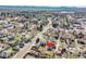 Aerial view featuring houses and lush greenery, creating a serene and peaceful environment at 2488 S Zurich Ct, Denver, CO 80219
