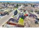 Charming home with a spacious yard and a detached garage, conveniently located near city amenities and mountain views at 2488 S Zurich Ct, Denver, CO 80219