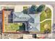 Birds-eye view of house showing neat landscaping, a well-kept backyard, and a charming walkway at 2488 S Zurich Ct, Denver, CO 80219