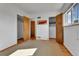 Bright bedroom with hardwood floors, three closets and a window at 2488 S Zurich Ct, Denver, CO 80219