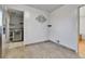 Bright breakfast nook with ample natural light, tile flooring, and a decorative wall hanging at 2488 S Zurich Ct, Denver, CO 80219