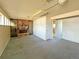 Basement with fireplace, carpeting, and access to adjacent rooms at 1822 Ura Ln, Northglenn, CO 80234