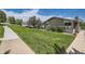Well-maintained townhome with lush green grass and inviting landscape at 21 Douglas N Dr, Broomfield, CO 80020