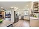 Modern kitchen features stainless steel appliances, and bright countertops at 21 Douglas N Dr, Broomfield, CO 80020