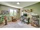 Comfortable bedroom featuring natural light, carpet flooring and space for a home office set up at 8065 W Fremont Dr, Littleton, CO 80128
