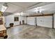 A two car garage with painted walls and ample room for parking and storage at 8065 W Fremont Dr, Littleton, CO 80128