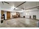 Garage with work bench, shelving and extra storage space for tools and gear at 8065 W Fremont Dr, Littleton, CO 80128