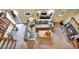 Spacious living room with a large sectional sofa, fireplace, and open layout at 8065 W Fremont Dr, Littleton, CO 80128