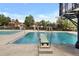 Community pool featuring a diving board and lane markers at 8065 W Fremont Dr, Littleton, CO 80128