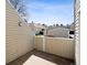 Private outdoor patio area with wood fence, perfect for relaxing at 13635 E Yale Ave # D, Aurora, CO 80014