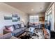 Inviting living room with modern decor, stylish furniture, and ample natural light at 155 S Monaco Street Pkwy # 311, Denver, CO 80224