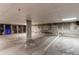 Spacious parking garage with marked parking spot and personal storage unit at 155 S Monaco Street Pkwy # 311, Denver, CO 80224