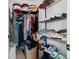 Walk-in closet with wire shelving provides ample storage for clothing and shoes at 5611 S Sicily Cir, Aurora, CO 80015