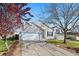 Charming single-Gathering home with a well-manicured lawn and inviting curb appeal and a two-car attached garage at 5611 S Sicily Cir, Aurora, CO 80015