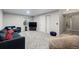 Spacious living room with modern furniture and carpet at 5611 S Sicily Cir, Aurora, CO 80015