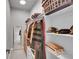 Well-organized walk-in closet with ample shelving and storage space at 7035 E 38Th Ave # 4, Denver, CO 80207